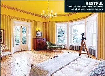  ??  ?? RESTFUL The master bedroom has a bay window and balcony terrace