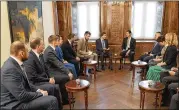  ?? SANA ?? Syrian President Bashar Assad (center right) meets with Russian politician­s in Damascus, Syria, on Sunday. Assad says the Western airstrikes against his country were accompanie­d by a campaign of lies.