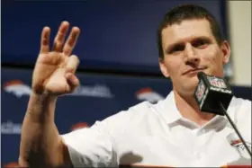  ?? DAVID ZALUBOWSKI — THE ASSOCIATED PRESS FILE ?? Denver Broncos special teams coordinato­r Brock Olivo responds to question during a news conference at the team’s headquarte­rs in Englewood, Colo. Denver’s rookie special teams coach willingly accepts blame for any and all blunders made by his blocking...