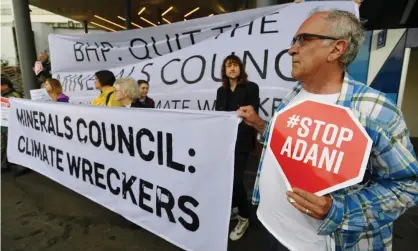  ??  ?? Minerals Council move comes amid fractures between members, including BHP, over its tough stance. Photograph: Joe Castro/ EPA