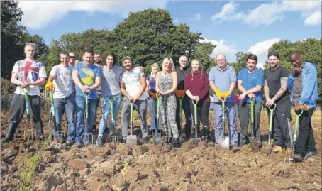  ?? Pictures: Andy Jones FM4524679/ FM4524685 ?? Workers from The COOK Kitchen, including Tony Pleasance and Zoe Smith, left, take part in Dandelion Time’s project to dig over a field in West Farleigh to make a vegetable patch