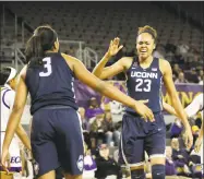  ?? Gerry Broome / Associated Press ?? UConn’s Azura Stevens (23) and Megan Walker react following a play against East Carolina on Wednesday.