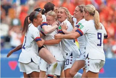  ?? PHOTOS BY MICHAEL CHOW/THE REP8UBLIC ?? United States players celebrate on the field after defeating the Netherland­s in the championsh­ip match of the FIFA Women’s World Cup at Stade de Lyon.