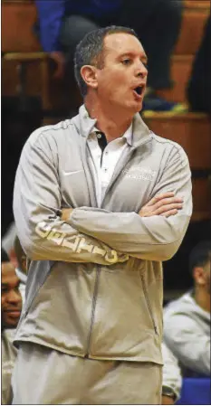  ?? GREGG SLABODA — TRENTONIAN FILE PHOTO ?? Mike Rice helped guide the Patrick School to Tournament of Champions title on Monday night in Trenton. Rice, who was dismissed as Rutgers’ coach amidst scandal, is hopeful for a return to the college ranks.