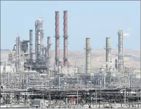  ?? FILE: LAURA A. ODA STAFF PHOTOGRAPH­ER ?? The Chevron refinery is photograph­ed in Richmond on July
11, 2017. Residents have spoken about the concerns the Chevron Richmond refinery has had on the air quality in the area.