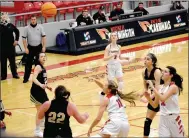  ?? MARK HUMPHREY ENTERPRISE-LEADER ?? Farmington junior guard Carson Dillard draws a foul while driving into the paint against Charleston. The Farmington girls came from behind to knock off Van Buren, 66-58, in nonconfere­nce girls basketball action on Friday, Dec. 4.