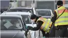  ??  ?? German police are now also checking individual­s arriving by car