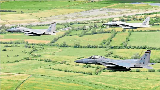  ??  ?? RAF Lakenheath posted online this image of three US F-15C Eagle fighter jets yesterday morning before the crash. It later said the image had been taken on a different day