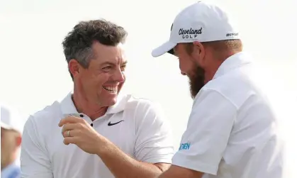  ?? Photograph: Jonathan Bachman/Getty Images ?? Rory McIlroy and Shane Lowry celebrate on the 18th green after winning the final round of the Zurich Classic of New Orleans.