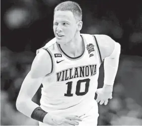  ?? BOB DONNAN/USA TODAY SPORTS ?? Donte DiVincenzo scored 31 points off the bench to lead Villanova to a second national title in three years.