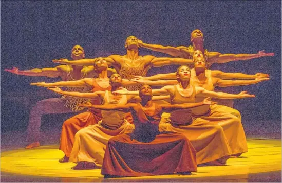  ?? Ringo H.W. Chiu For The Times ?? DANCERS PERFORM the Alvin Ailey American Dance Theater’s “Revelation­s” at the Dorothy Chandler Pavilion in Los Angeles in 2013. It premiered 47 years ago.