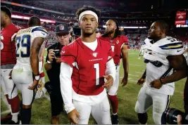  ?? ASSOCIATED PRESS ?? ARIZONA CARDINALS QUARTERBAC­K Kyler Murray (1) stands at midfield after last Thursday’s preseason game against the Los Angeles Chargers in Glendale.