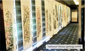  ??  ?? Traditiona­l Chinese paintings exhibit