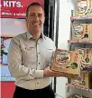  ??  ?? New World Thorndon retail manager Reese Drake with one of Foodstuffs’ Just Cook It meal kits.