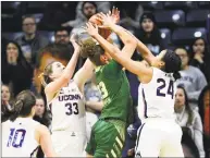  ?? Stephen Dunn / Associated Press ?? UConn’s Katie Lou Samuelson (33) and Napheesa Collier defend against South Florida’s Tamara Henshaw on Sunday.