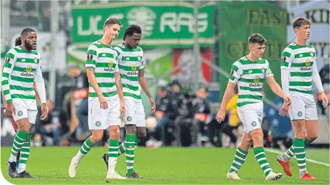  ??  ?? Olivier Ntcham, Mikael Lustig, Dedryck Boyata, Jack Hendry and Kieran Tierney troop off after Thursday night’s defeat