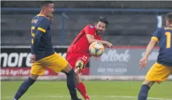  ?? PRESSEYE ?? Close: Curtis Allen sends in a shot on goal for Coleraine