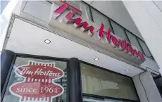  ?? EDUARDO LIMA/THE CANADIAN PRESS ?? Restaurant Brands, the owner of Tim Hortons, reports a second-quarter profit of US$90.9 million.