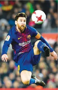  ??  ?? AFP
Barcelona’s Argentinia­n forward Lionel Messi controls the ball during the Spanish ‘Copa del Rey’ (King’s cup) quarterfin­als second leg football match between FC Barcelona and RCD Espanyol at the Camp Nou stadium in Barcelona on Saturday.