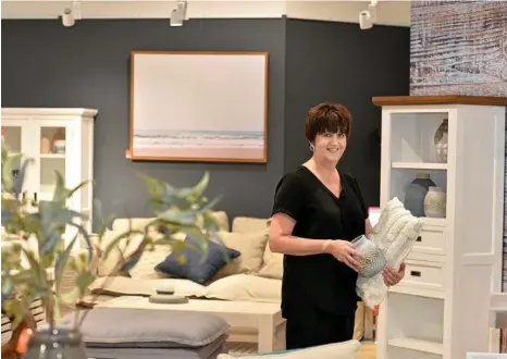  ??  ?? NEW TO TOWN: Oz Design Furniture manager Tracey Turnbull is excited to have opened in Toowoomba’s new Home Consortium. PHOTOS: KEVIN FARMER