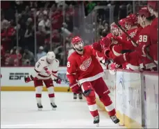  ?? PAUL SANCYA — THE ASSOCIATED PRESS ?? Detroit Red Wings defenseman Jake Walman (96) celebrates his goal against the Carolina Hurricanes in the third period of Thursday’s game in Detroit.