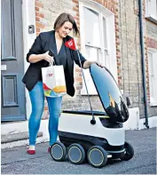  ??  ?? One of the Just Eat robots in action delivering a takeaway