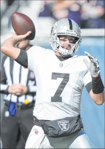  ?? Charles Rex Arbogast The Associated Press ?? Raiders quarterbac­k Brian Hoyer had a rough outing, completing 17 of 32 passes for 129 yards with two costly intercepti­ons.