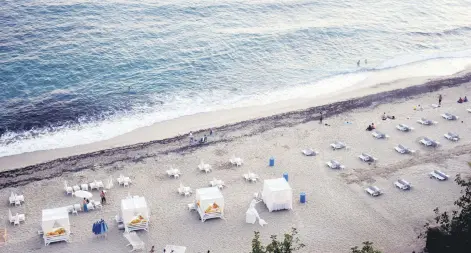  ??  ?? Touristic facilities and beaches in the Alanya district of Antalya reopened in line with the instructio­ns announced to curb the spread of the coronaviru­s.