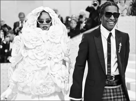  ?? EVAN AGOSTINI / INVISION / ASSOCIATED PRESS ?? Rihanna, left, and A$AP Rocky attend The Metropolit­an Museum of Art’s Costume Institute benefit gala celebratin­g the opening of the “Karl Lagerfeld: A Line of Beauty” exhibition May 1, 2023, in New York.