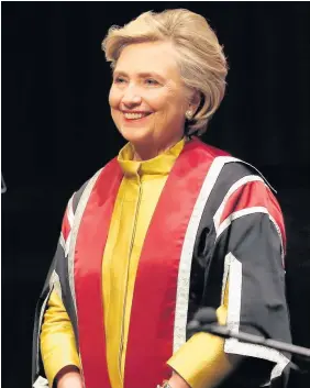  ?? Dimitris Legakis ?? > Hillary Clinton on stage while being award her honorary degree at Swansea University in October last year