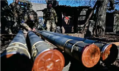  ?? ?? Ukrainian service personnel prepare shells in Zaporizhzh­ia region. The country’s defence budget increased nearly nine times to $31.1bn during 2023. Photograph: Reuters
