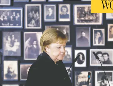  ?? KACPER PEMPEL/REUTERS ?? German Chancellor Angela Merkel reacts during a tour on Friday of Auschwitz-birkenau, her first visit
to the former Nazi German concentrat­ion and exterminat­ion camp near Oswiecim, Poland.