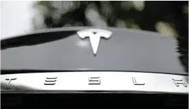  ?? /Reuters ?? Slow to refresh: Tesla has been slow to refresh its ageing models, while rivals in China, the world’s largest car market, roll out cheaper models.