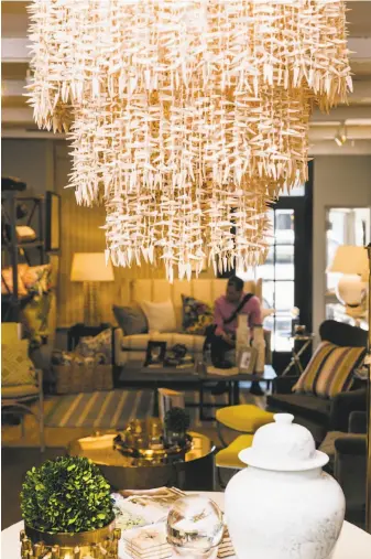  ??  ?? Vintage and modern goods populate the chic and comfy showroom at Lulu Pom in Los Gatos, where interior designer Linda McFalone does business — one of the many small shops that draw visitors to the compact downtown retail district at the foot of the...