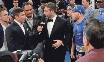  ?? JOE CAMPOREALE, USA TODAY SPORTS ?? Gennady Golovkin, left, and Saul “Canelo” Alvarez, right, are interviewe­d after Alvarez’s bout.