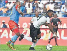  ?? Photos: Khaledd Desouki, Issouf Sanogo and Justin Tallis/AFP ?? Key players: Clockwise from above, Burkinabé midfielder Alain Traore (back) and forward Bertrand Traore. Ghana’s forward Jordan Ayew (right) challenges the DRC’s midfielder Remi Mulumba. Egypt’s goalkeeper Essam El-Hadary