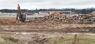  ?? PHOTO BY MIKE PARE ?? The former Tennessee Air National Guard hangar has been demolished and the airport is preparing the site for a new hangar and parking facilities pending approval of the Chattanoog­a/Hamilton County Regional Planning Commission.