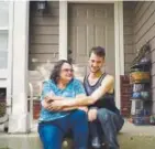  ?? Joe Amon, The Denver Post ?? Elizabeth Pate, 58, and her adopted son, Stephen Morgan, 22, sit on the porch at their home in Broomfield. Stephen came to live with Elizabeth in December 2013 and was adopted a year and a half later.