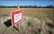  ?? NWA Democrat-Gazette/DAVID GOTTSCHALK ?? A section of property Monday southeast of North 54th Avenue and West Persimmon Street in Fayettevil­le. The Planning Commission on Monday considered rezoning a patch of land the city owns near the Woolsey Wet Prairie to install solar panels for the Westside Wastewater Treatment Plant.