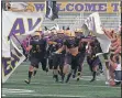 ?? RANDY MEYERS - FOR THE MORNING JOURNAL ?? The Avon Eagles take the field to start the 2019footba­ll season against Avon Lake on Aug. 30, 2019.