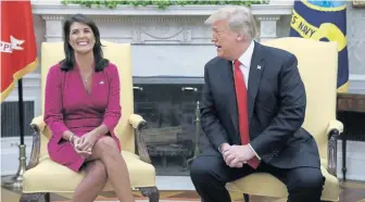  ?? EVAN VUCCI/AP ?? CHAT: U.N. Ambassador Nikki Haley meets with President Trump in the Oval Office this week.