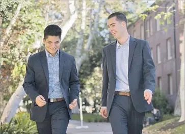  ?? Maya Dondonyan USC ?? EDWIN SAUCEDO, left, will graduate from USC, turning over the reins as student body president to Austin Dunn. Saucedo, whose parents emigrated from Mexico, was the first in his family to attend college.