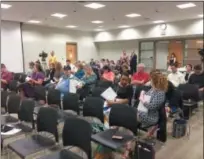  ?? EVAN BRANDT — DIGITAL FIRST MEDIA ?? A crowd of about 35 people showed up at Thursday’s Upper Perkiomen School Board meeting to learn more about the mold problem that closed the high school for a week.