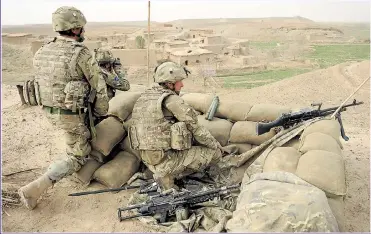  ??  ?? THREAT: British combat soldiers during the recently ended campaign in Afghanista­n