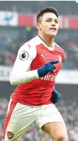  ?? — AFP photo ?? Arsenal's Chilean striker Alexis Sanchez celebrates after scoring their second goal from the penalty spot during the English Premier League football match between Arsenal and Hull City at the Emirates Stadium in London on February 11, 2017.