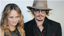  ?? MARTIN BUREAU/GETTY Images ?? Vanessa Paradis and Johnny Depp have separated after 14 years
together. “Relationsh­ips are very difficult,” Depp says.