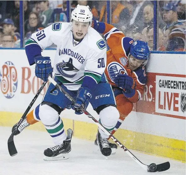  ?? — GETTY IMAGES FILES ?? Vancouver Canucks forward Brendan Gaunce sidesteps a check from Edmonton’s Andrej Sekera in an April game at Rexall Place in Edmonton. Getting called up at the end of last season gave Gaunce the confidence he could compete at the highest level.