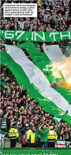  ??  ?? Flashpoint: the Green Brigade, pictured here during a game against Hearts in 2017, have been suspended by Celtic for tonight’s clash at Parkhead