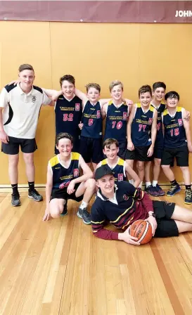  ??  ?? The St Paul’s Warragul junior school years 5/6 hoop time Basketball team qualified to compete at the state grand final day. Pictured back row from left Lachlan Bambridge (coach), Caleb Kriesl, Zach Bambridge, Lachlan Giliam, Oliver Wilson, Harry Vanschynde­l, Charlie Tsuchida, front row William Brewer, Riley McLeod and Lachlan Wilson (coach).