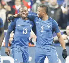  ?? — Reuters photo ?? File photo shows France’s N’Golo Kante (left) and Patrice Evra celebratin­g a goal during the Euro 2016 tournament in France.